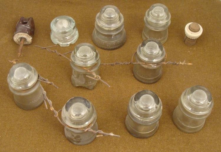 11 OLD INSULATORS FOR HIGH TENSION WIRES: 11 OLD INSULATORS FOR HIGH TENSION WIRES. SOME OF THEM COME WITH BARBED WIRE. * *