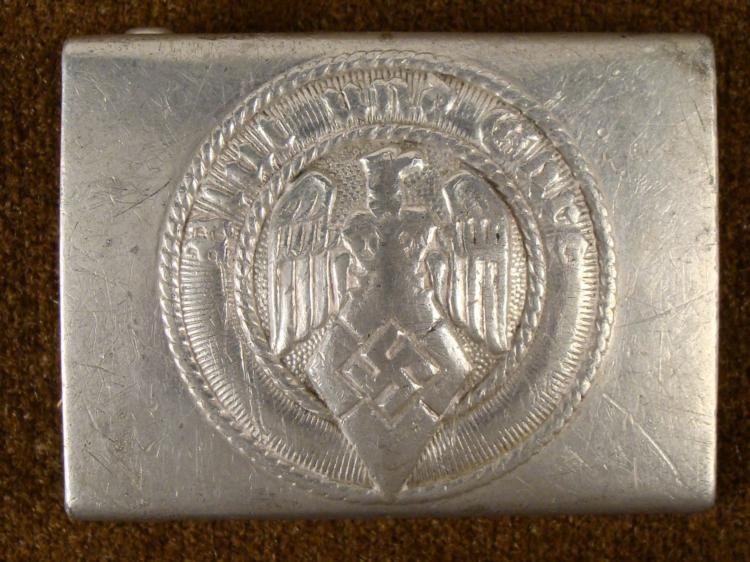 HITLER YOUTH BLUT UND EHRE ORIGINAL BELT BUCKLE: THIS IS A GREAT LOOKING HITLER YOUTH "BLUT UND EHRE" ORIGINAL BELT BUCKLE. IT HAS AN EAGLE WITH HJ DIAMOND ON THE FRONT AND IS MARKED M4/38 ON THE BACK. * * * *