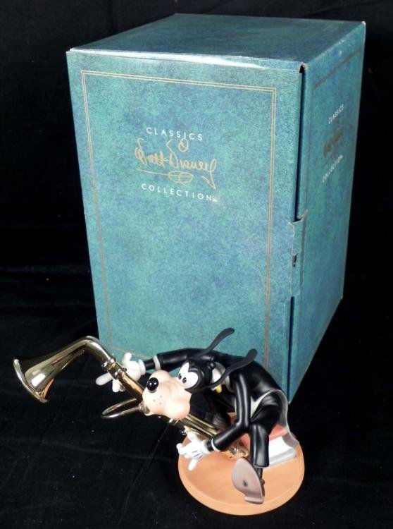 Goofy's Grace Notes Disney Society Sculpture 93 MIB: Goofy plays his big saxophone his grace, as this sculpture is titled Goofy's Grace Notes. The 6 3/4" tall resin figure was designed by Disney artists, and hand crafted with loving detail. It was creat