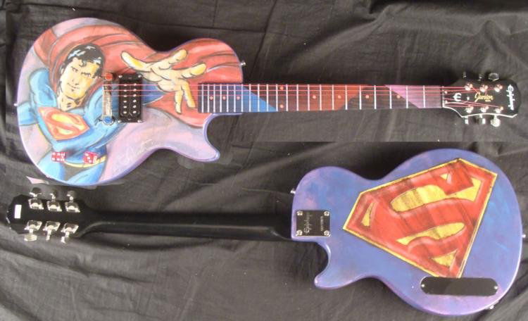 Superman Superhero Original Painting Duerrstein Guitar: This mild-mannered Epiphone Gibson electric guitar has been transformed into a super-heroic instrument. It's a real guitar, it's hand-painted, it's Superman! This one and only original guitar was crea