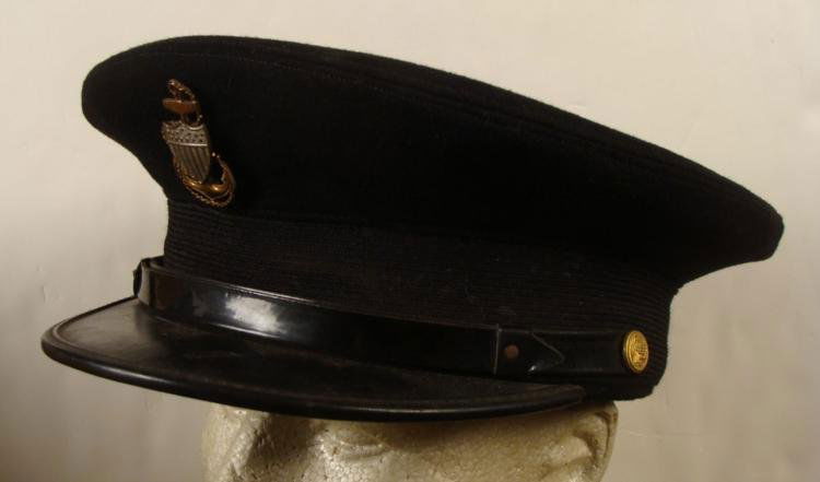 USN Navy Officer Cap WWII w/Rare Anchor Pin: This is a US Navy Officer Cap from WWII. The front has a Rare Anchor pin. The hat is black wool with leather sweat band. The size appears to be 7 1/8.