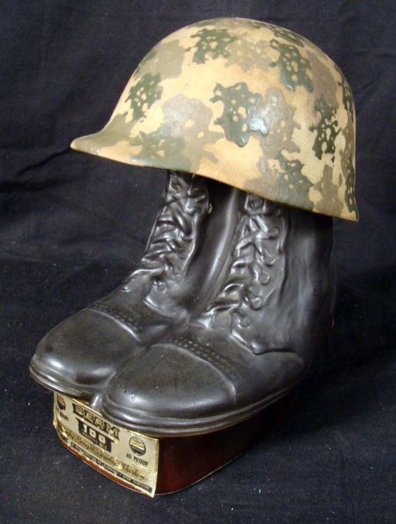 GI MILITARY BOOTS & CAMO HELMET JIM BEAM DECANTER 1984: GI MILITARY BOOTS & CAMO HELMET-CERAMIC PIECE BY JIM BEAM-VINTAGE 1984 * GREAT DISPLAY PIECE- 8X9" *