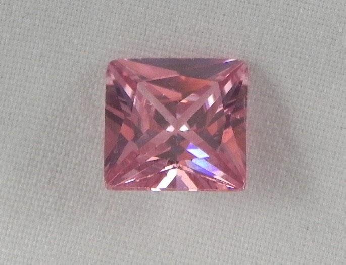 4.15 Ct. Natural Zircon Pink Square Gemstone: Gem Type: Natural ZirconTotal Carat Weight: 4.15 Ct.Color: PinkShape: SquareQuality: High quality, with excellent cutting, clarity, and luster