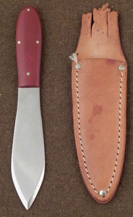 CASE XX 303 SPEAR POINT THROWING KNIFE: THIS IS A CASE XX 303 SPEAR POINT THROWING KNIFE WITH PARTIAL LEATHER SHEATH. IT IS 7 1/4" LONG AND HAS BAKELITE TYPE GRIPS. *