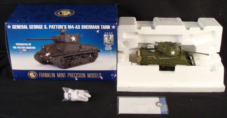 Franklin Mint M4-A3 Sherman Tank George S. Patton 1/24: This is a George S. Patton edition of the M4-A3 Sherman Tank, produced by the Franklin Mint. It is in Mint condition in the original box. This is a 1/24 scale, all diecast model, hand-assembled, with 