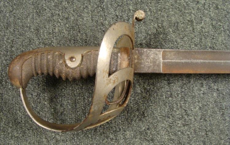 IMPERIAL GERMAN TRAIN BASKET HILT SABER FISHSKIN GRIP: IMPERIAL GERMAN TRAIN BASKET HILT SABER-MASSIVE NICKLE HILT W/FISHSKIN GRIP * HUGE HILT ON THIS GERMAN SWORD FROM PRE-WWI--CIRCA 1880'S--34" BLADE SHOWS MUCH DISCOLORATION NO SCABBARD-SWORD NEEDS SOME