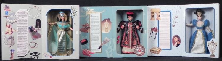 3 Barbie Great Eras Egyptian Queen Chinese Emp French: These are three Barbies from the Great Eras Collection, and they feature some powerful and enchanting ladies. Egyptian Queen, Special Edition, wearing a golden headdress with vulture feather design, a