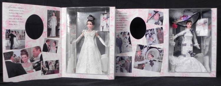 Two Eliza Doolittle Barbie in My Fair Lady Mint in Box: Offered here are two Eliza Doolittle Barbie dolls in My Fair Lady, both are in their original boxes. * * **Meet Eliza, making a grand entrance at the Embassy Ball. In her exquisite gown an