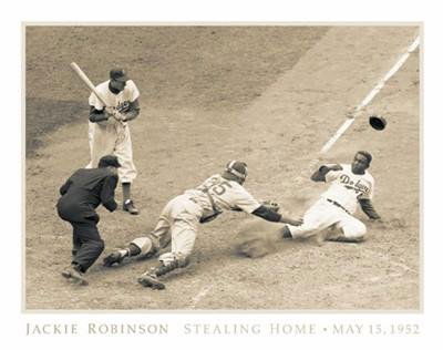 Jackie Robinson Bettmann Archive Baseball Art Print: This great moment is captured as Jackie does a surprise run to home plate.Source: Bettmann ArchiveTitle: Jackie Robinson Stealing Home, May 18, 1952Medium: Print on paper * Paper: 12 x 16Image: 9 1/2