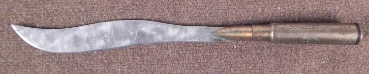 WWII PACIFIC THEATRE TRENCH ART BULLET LETTER OPENER: HERE IS A WWII PACIFIC THEATRE TRENCH ART BULLET LETTER OPENER WITH JAPANESE KANJI WRITING. THE LETTER OPENER IS 7" LONG. *