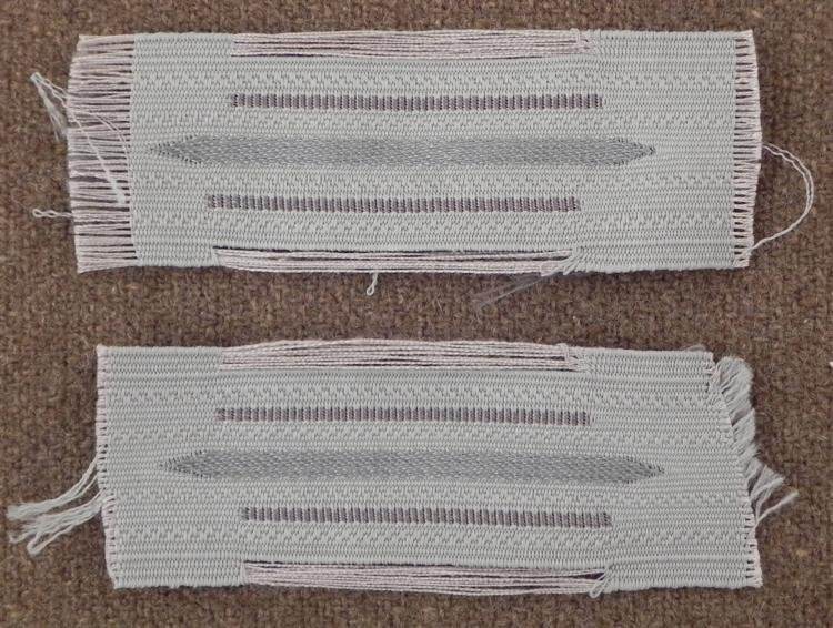PR NAZI NCO FABRIC COLLAR TAB INSIGNIA: THIS IS A PR NAZI NCO FABRIC COLLAR TAB INSIGNIA THAT IS GRAY WITH FRAYED EDGES. * *