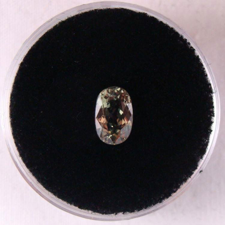 1.36 CT ALEXANDRITE GREEN-ORANGE OVAL GEMSTONE: GEM TYPE: ALEXANDRITEQTY: 1TOTAL CT WEIGHT: 1.36COLOR: GREEN-ORANGECLARITY: VSGRADE: NATURALCOMMENT: OVAL