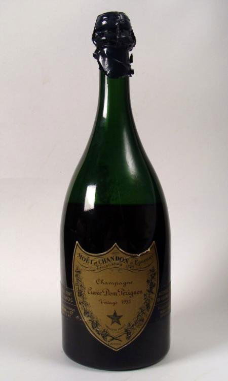 1955 Don Perignon Sealed Champagne Collectors Bottle: This bottle is for the ages. Offered here is a 1955 Moet et Chandon Cuvee Don Perignon collectors champagne bottle. The bottle has never been opened and the champagne is still inside. 