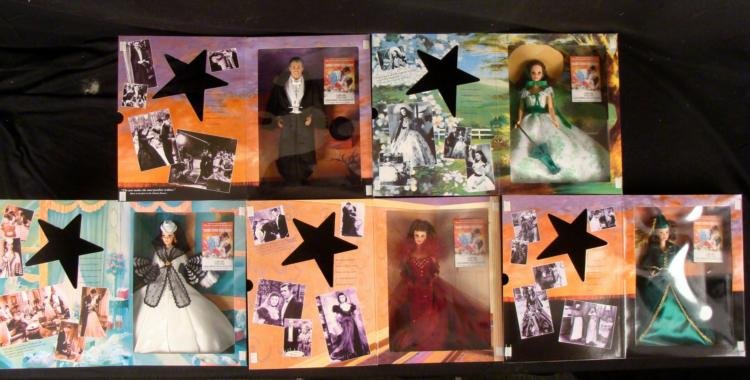 6 Hollywood Gone w/ the Wind Barbies Scarlett Rhett MIB: These six Barbie dolls from the Hollywood Legend Collection. They are all dressed up as characters from the classic movie, Gone with the Wind. * * Barbie as Scarlett O'Hara: Green & White Spring D