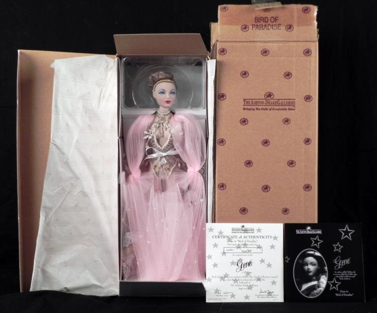 15" Gene Doll Bird of Paradise Ashton-Drake MIB: This 15 inch Gene doll is called Bird of Paradise, and she is in mint condition in the original box, with shipping box. She wears an elaborate showgirl costume, circa 1920's, all designed by Mel Odom 