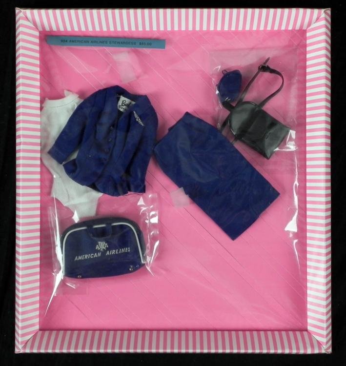 Barbie Vintage 1961 Airline Stewardess Outfit #984 Mint: This is a vintage 1961 Barbie complete American Airlines Stewardess Outfit, #984. It is in mint condition, and nicely laid out in a Barbara Peterson box. * Included are: * Shirt, coat, skirt, hat, pur