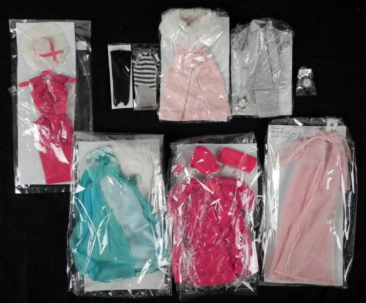 8 Vintage Original Barbie Doll Outfits 1959-62: Here is a collection of 9 vintage Barbie Doll Outfits, all from the early Barbie period, including her very first outfit! They are in good to excellent condition, wrapped in plastic for protection. *