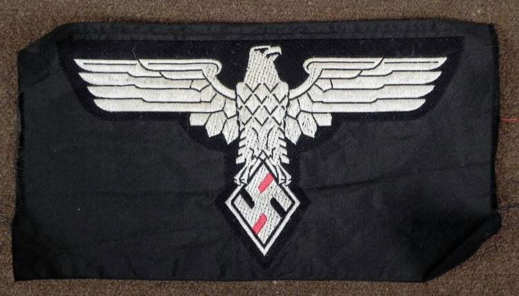 LARGE NAZI HITLER YOUTH PATCH: OFFERED HERE IS A LARGE NAZI HITLER YOUTH PATCH, WITH AN EAGLE WITH A SWASTIKA IN DIAMOND. IT MEASURES OUT TO BE 3 1/2" X 7". IT MAY BE POST-WAR, BUT WE ARE NOT SURE. *
