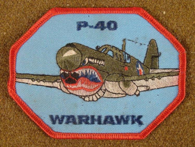 WWII P-40 WARHAWK PATCH: THIS IS A WWII P-40 WARHAWK PATCH, THAT IS 3X4". THE PATCH IS PROBABLY POST-WAR. *
