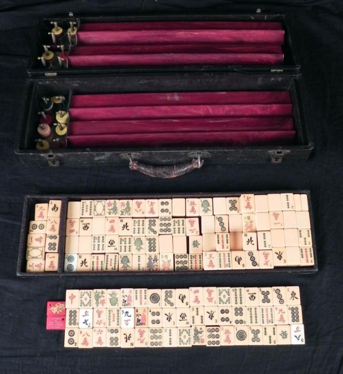 Vintage Mahjong Game Set in Case 157 Tiles Mah Jongg: This is a vintage Mah Jongg set, and it comes complete in the original carry case. The case is lizard pattern black leather, with brass latches, leather-wrapped handle, and separate tray. The pieces i