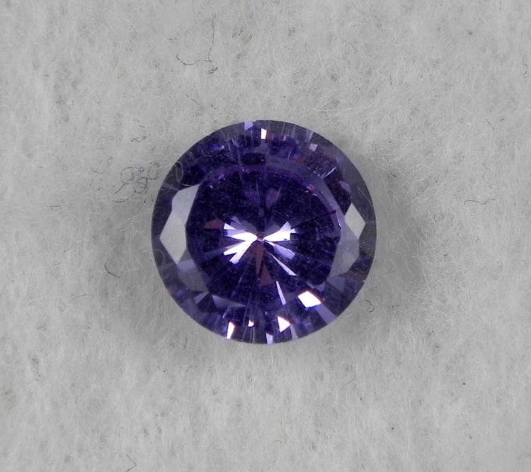 8.0 ct Natural Zircon Gemstone, Round Shaped Lt Purple: Gemstone: Natural ZirconStyle: RoundColor: Light PurpleCarat weight: 8.0Condition: Very high quality, with excellent cutting, clarity, and luster
