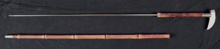 1910 CANE SWORD-WHALES TOOTH GRIP W/SECRET COMPARTMENT: OUTSTANDING CIRCA 1910 CANE SWORD-WHALES TOOTH GRIP W/SECRET COMPARTMENT-CANE SCABBARD * * 33 1/2" O/A LENGTH-GREAT 100 YEAR OLD WORKMANSHIP IN THIS HIDDEN CANE SWORD-SCABBARD IS ACTUAL CANE-THE 
