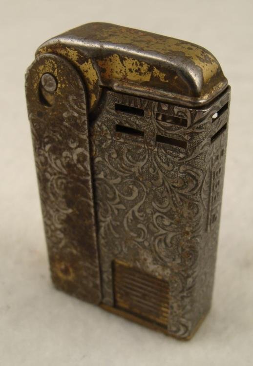 WWII U.S. MILITARY "REGENS" OFFICER'S TRENCH LIGHTER: WWII U.S. MILITARY "REGENS" OFFICER'S TRENCH LIGHTER-FULL FANCY FILIGREE W/GOLD TONES * HIGH END REGENS TRENCH LIGHTER-"REGENS" RAISED LETTERS ON SIDE--MADE IN USA & PAT # ON BOTTOM *