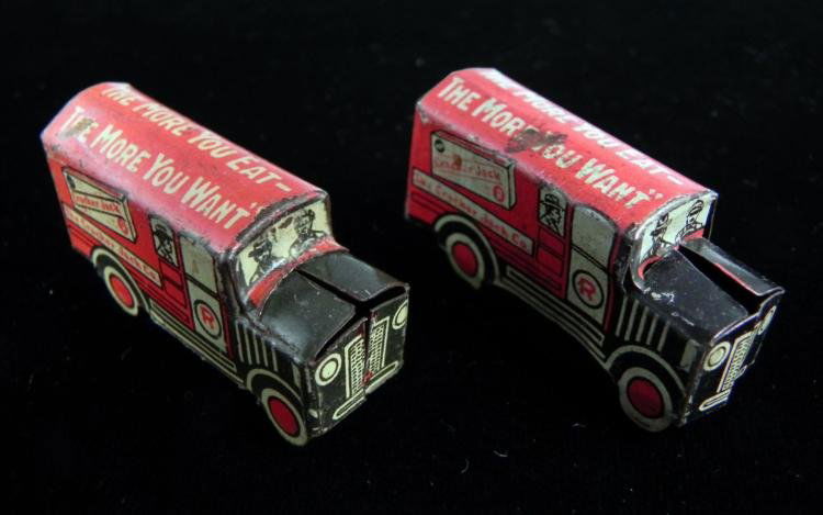 2 Vintage Cracker Jack Prizes Tin Litho Delivery Trucks: Here are two antique Cracker Jack prizes. They date from the 1920's or1930's. These are lithographed tin delivery trucks. The sides show the delivery driver, and the rear doors are marked Angelus Mars