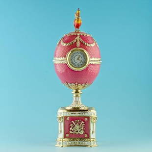 Rothschild Faberge Inspired Egg: Rothschild Faberge Inspired Egg, measures 9 inches H X 3 in, materials Pewter, Enamel, Crystals. The Rothschild egg is a jewelled, enameled decorated egg made under the supervision