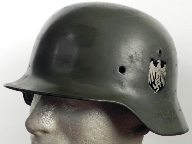 NAZI M40 DOUBLE DECAL HELMET: HERE IS A NAZI M40 DOUBLE DECAL HELMET-. IT HAS BOTH DECALS INTACT AND IS THE SHELL ONLY. THERE IS NO LINER OR RIVETS. IT IS POSSIBLE THAT THE HELMET HAS BEEN RE-PAINTED. "4452" HAS BEEN STAMPED ON TH