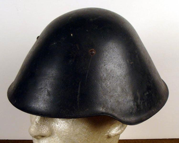 ORIGINAL GERMAN VOPO COMBAT HELMET: THIS VERY RARE ORIGINAL GERMAN VOPO COMBAT HELMET WITH FULL LINER AND CHINSTRAP. THE OWNERS NAME IS ON THE INSIDE WITH A NAZI LEATHER LINER. * * * * *
