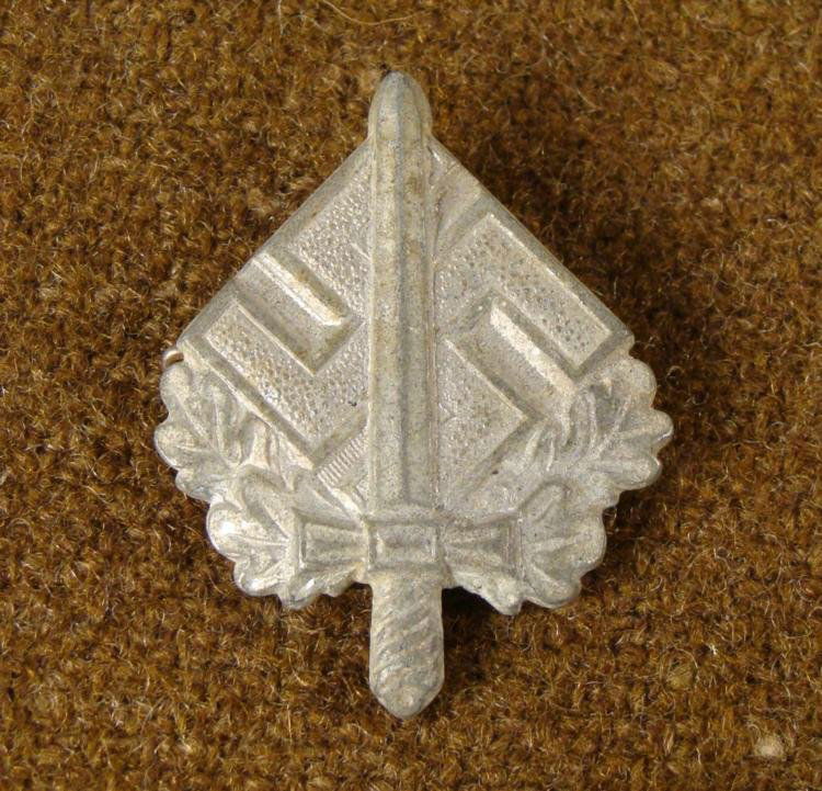 EARLY ORIGINAL NAZI BADGE WWII: THIS IS AN ORIGINAL EARLY NAZI BADGE WITH SWASTIKA & SWORD. ON THE BACK IT IS MARKED "0 27" AND IS A PIN BACK. * * * * * * *