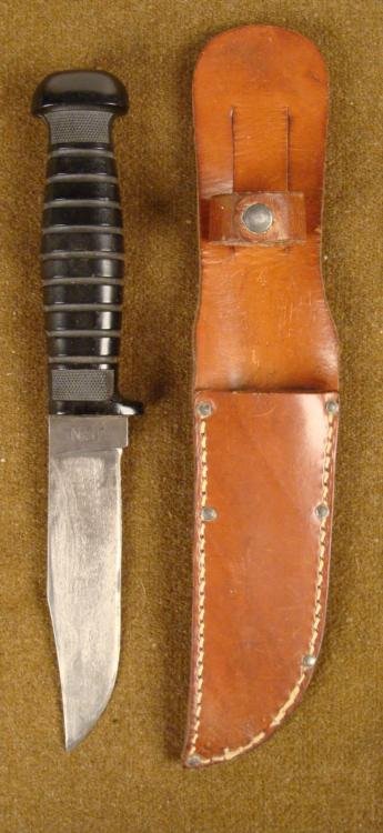 U.S. NAVY COMBAT FIGHTING KNIFE BY COLONIAL W/ SHEATH: U.S. NAVY COMBAT FIGHTING KNIFE BY COLONIAL WITH LEATHER SHEATH * * U.S. NAVY FIGHTING COMBAT KNIFE-WIDE, CLIP-POINT 5 1/8" BLADE--RICASSO MARKED "USN"--REVERSE "COLONIAL- PROV. RI