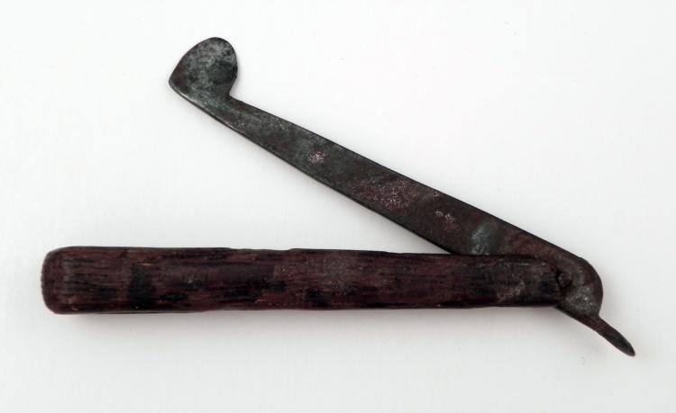 Antique Bleeder Colonial Period Medical Surgical Tool: This is an bleeder dating back to the American Colonial period. This is a medical instrument used for bloodletting. It consists of a metal blade with rounded end which swings out from the wooden handl