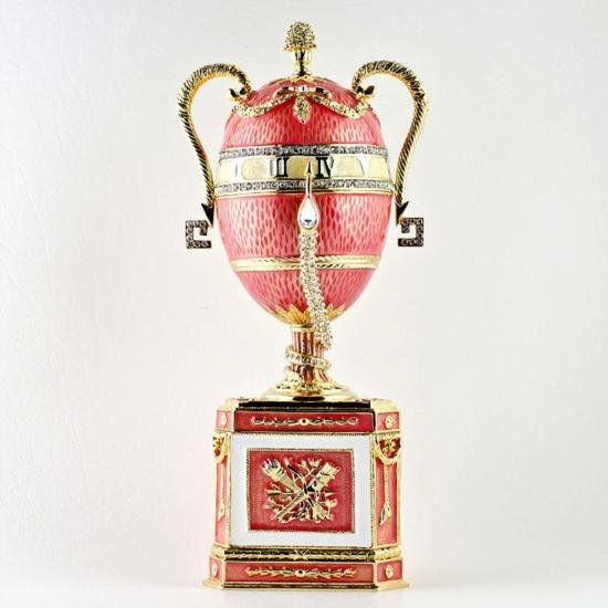Duchess of Marlborough Faberge Style Egg: Duchess of Marlborough Faberge Style Egg, measures 7.75inches H X 2.75 in, music Box plays ~Nutcracker~ by P. Tchaikovsky, materials Pewter, Enamel, Crystals. The Duchess of Marlbo