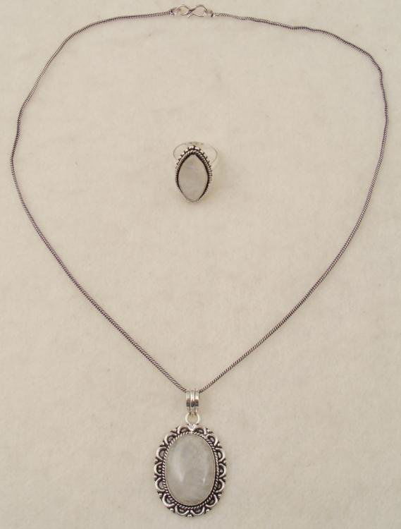 Rainbow Moonstone 2 Pc Sterling Ring, Pendant Necklace: Sterling Ring, Pendant Necklace Set * Gemstone: Rainbow Moonstone Pendant: 20 x 28 mm stone, on sterling setting with twist and beaded border, on 22" chainRing: 1 1/4" elipicle shape, on sterling sett