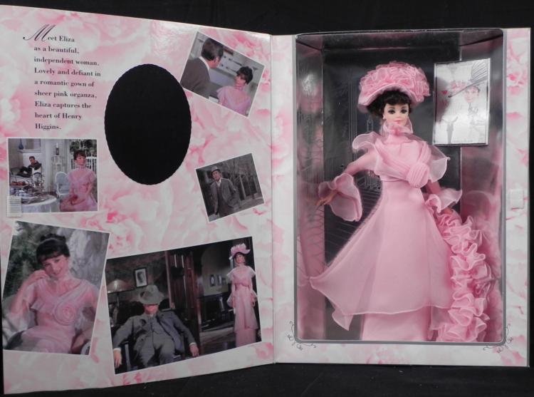 Barbie as Eliza Doolittle My Fair Lady Doll Pink Dress: Meet Eliza as a beautiful independent woman. Lovely and defiant in a romantic gown of sheer pink organza, Eliza captures the heart of Henry Higgins. * We are offering a very large collection of 