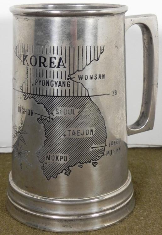 ETCHED KOREAN WAR STEEL MUG WITH TIGER AND MAP OF KOREA: OFFERED HERE IS A ETCHED KOREAN WAR STEEL MUG WITH TIGER IN BAMBOO & MAP OF KOREA. IT IS VERY WELL DONE, 5 1/2 " TALL AND IS BEAUTIFULLY ETCHED. *