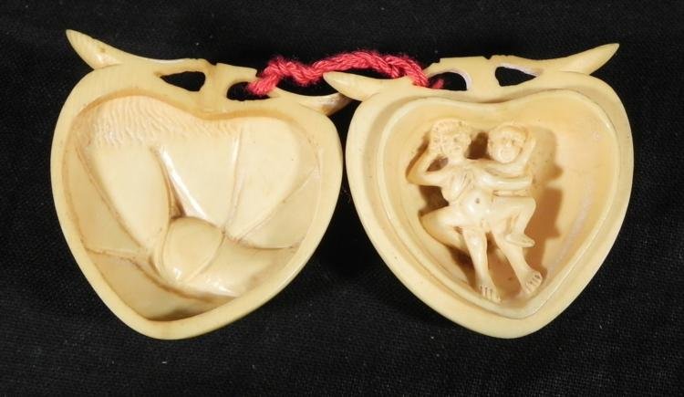 Double Erotic Vintage Ivory Secret Heart Pendant -Rare: What's the secret of this heart-shaped vintage ivory pendant? Open the two sides, and two erotic scenes will be revealed. On one side, a couple together, and on the other side, a close-up of their int