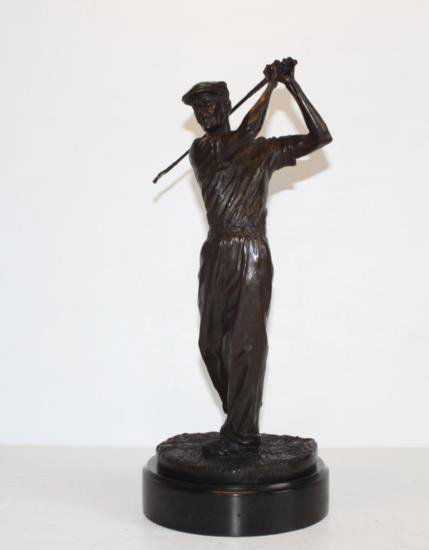 Splendid Ben Hogan Golfer Bronze Sculpture After Ron: Splendid Ben Hogan Golfer, Bronze Sculpture, After Ron Tunison 14.5"H x 6.5"W x 6.5"D 15 lbs. This bronze sculpture was produced using the Lost Wax casting method. The Lost Wax Cast method is