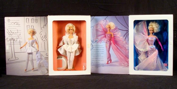 2 Classique Collection Barbies Uptown Extravaganza MIB: These are two Barbies wearing clothes from designer, Kitty Black Perkins, from the Classique Collection. * * Uptown Chic barbie doll: Oh, so chic leather-and-lace look with sparkle n' style (box has m