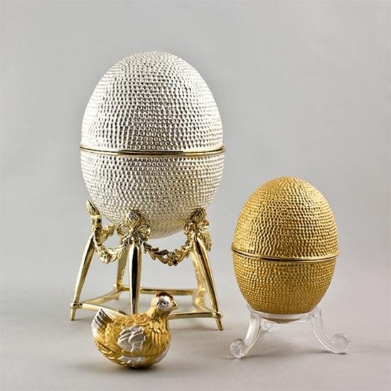 Faberge Hen Egg: Faberge Hen Egg. Material: Pewter, Enamel, Weight: apprx 2lbs. The famed Faberge eggs are jeweled eggs, often with the most ornate, minuscule designs on them. The House of Faberge made