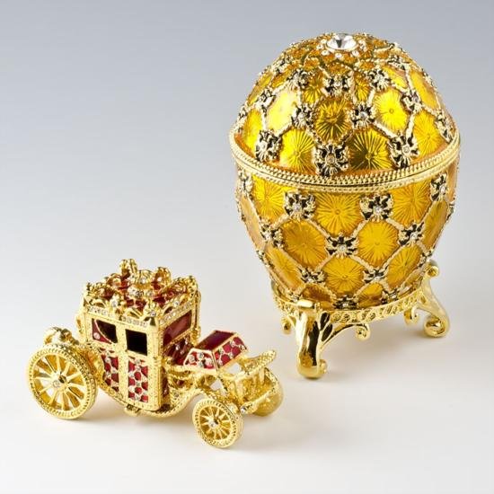 Faberge Coronation Egg: Faberge Coronation Egg, Dimensions: 3.5in (H) X 2.5in (W), Weight: 1 lb 2 oz, Material: Pewter, Crystals, Enamel. The Coronation Egg from 1897 is the most famous and celebrated of 