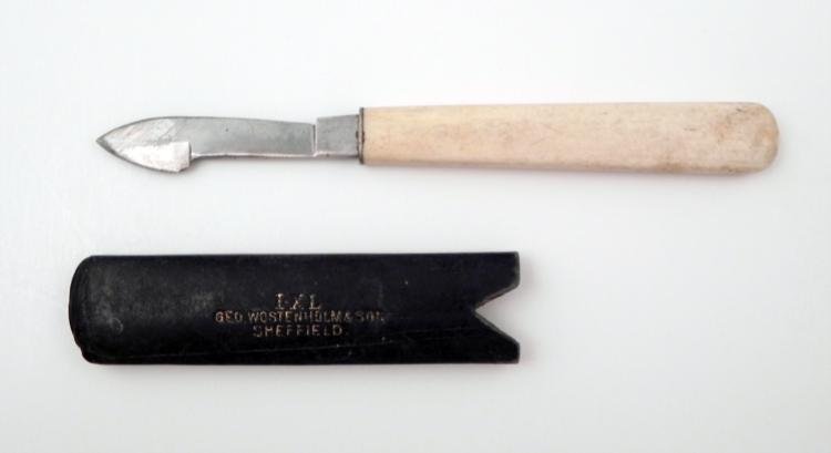 Wostenholm Sheffield Antique Knife Surgical Tool w/Case: Here is an antique knife made by George Wostenholm & Son of Sheffield, England. This knife appears to be from medical use, possibly a fleam. It consists of a metal blade with maker mark, and ivory