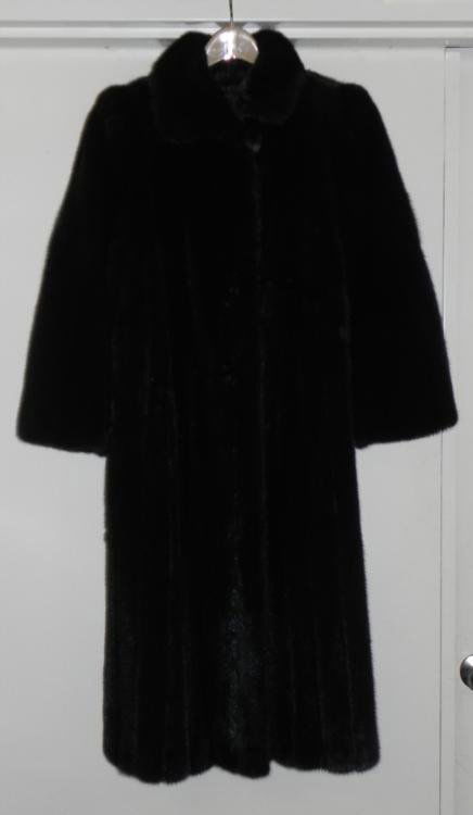Dark Mink Fur Full Lenth Ladies Coat -York Furrier: This is a ladies dark ranch mink full length coat from York Furrier and Lanvin Furs. It has a soft, luxurious fur, with color added. There are two well-concealed hand pockets. The closures include a l