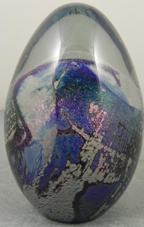 Robert Eickholt Art Glass Mountain Egg Paperweight: This egg-shaped paperweight by the master glass artist features blue and snow white moutainous forms and a layer of shimmering dichroic above. * * Glass artist: Robert Eickholt * Signature: Etched on 