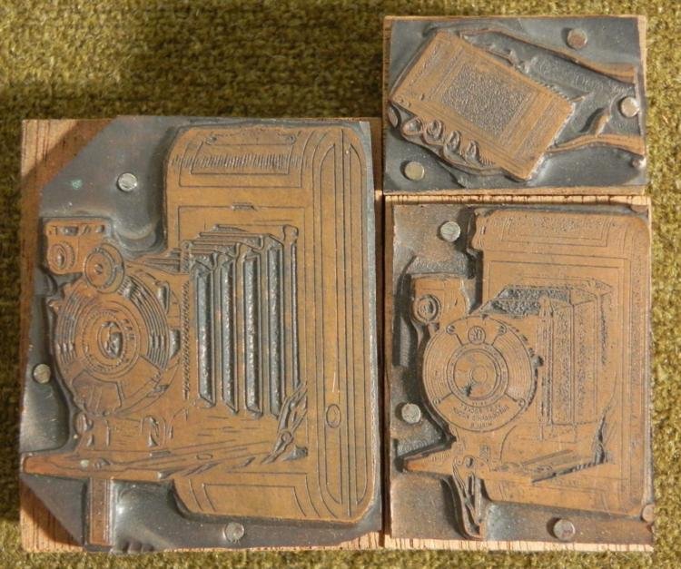 3 Kodak Camera Ad Copper Print Blocks Cameras 1920s: These three copper printers blocks were made for print advertisements for Kodak cameras around the 1920's. They come from a collection of Kodak print blocks. They portray two great looking Kodak foldi