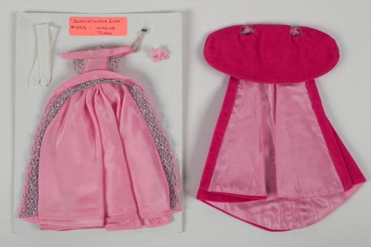1963 Barbie Vintage Sophisticated Lady Outfit: This vintage outfit is from the 1963 Barbie Doll called Sophisticated Lady. * Included: Pink gown with silver trim, velvet cape, white gloves, pink shoes, white pearl necklaceNot included: Tiara, but 