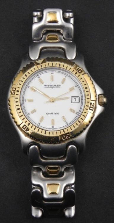 Wittnauer Mens Date Watch Chronograph Style: This Wittnauer is a classic date watch, with a sporty band. * * Movement: Quartz * Type: Ratcheting bezel, chronograph style * Dial: White face, with luminous hands and hour markers * Date: Analog dat