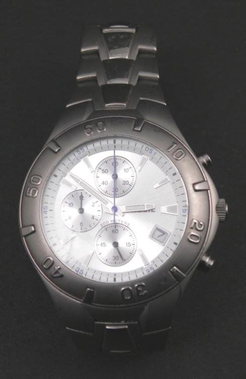 Fossil Blue TI-5070 Titanium Mens Chronograph Watch: This Fossil Blue series watch combines a sporty chronograph with titanium and the style of a dress watch. * * Model: TI-5070 * Movement: Quartz * Type: Chronograph, with seconds, minutes, and hours di